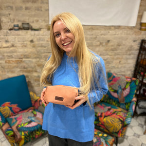 workshop participants with toiletry bags