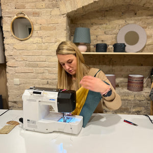 workshop participants with toiletry bags