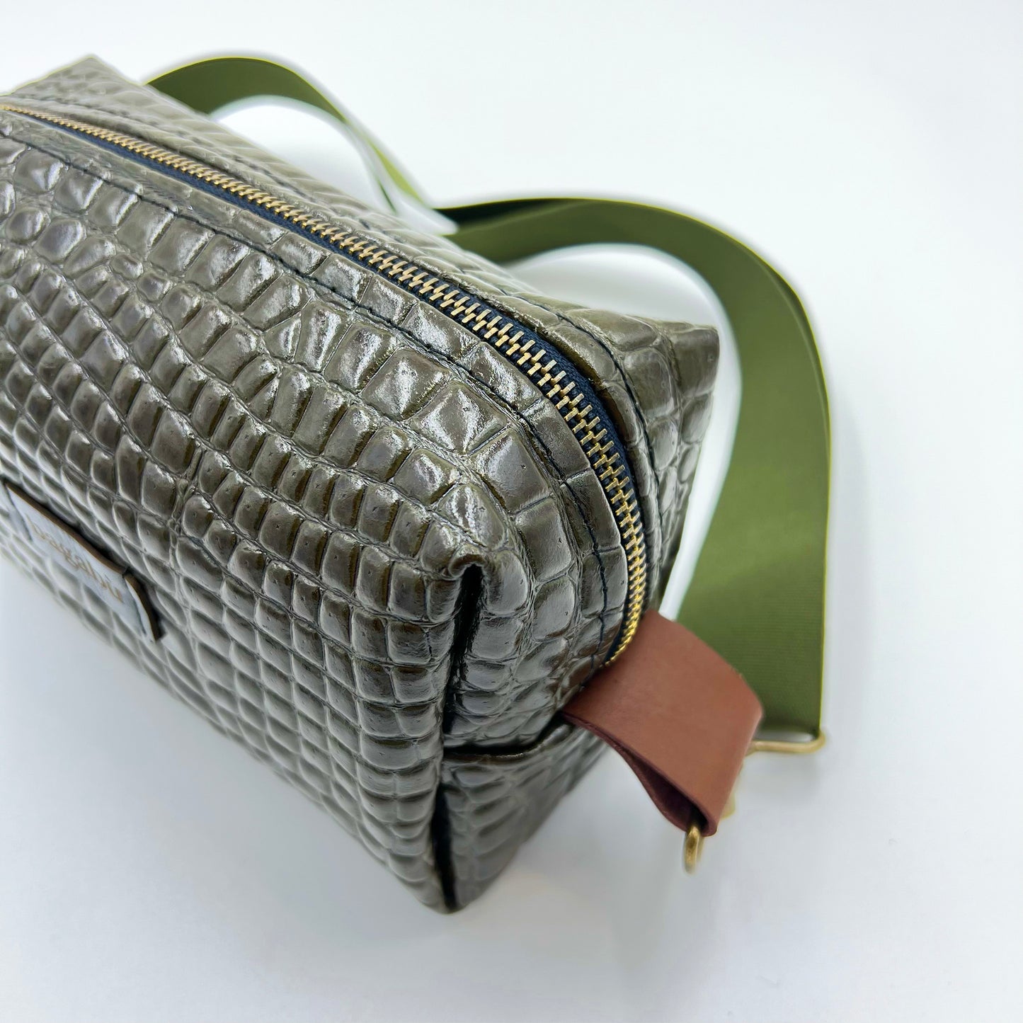 green leather bag