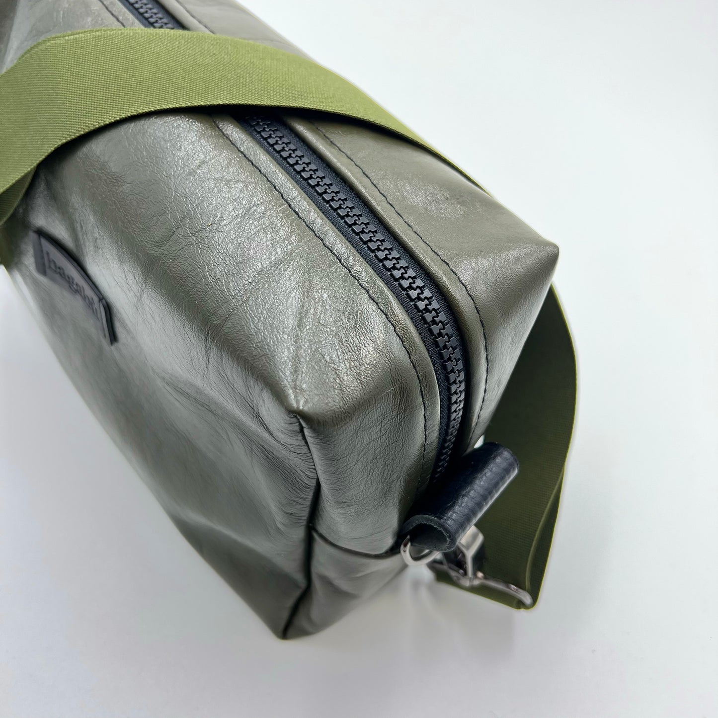 green leather bag
