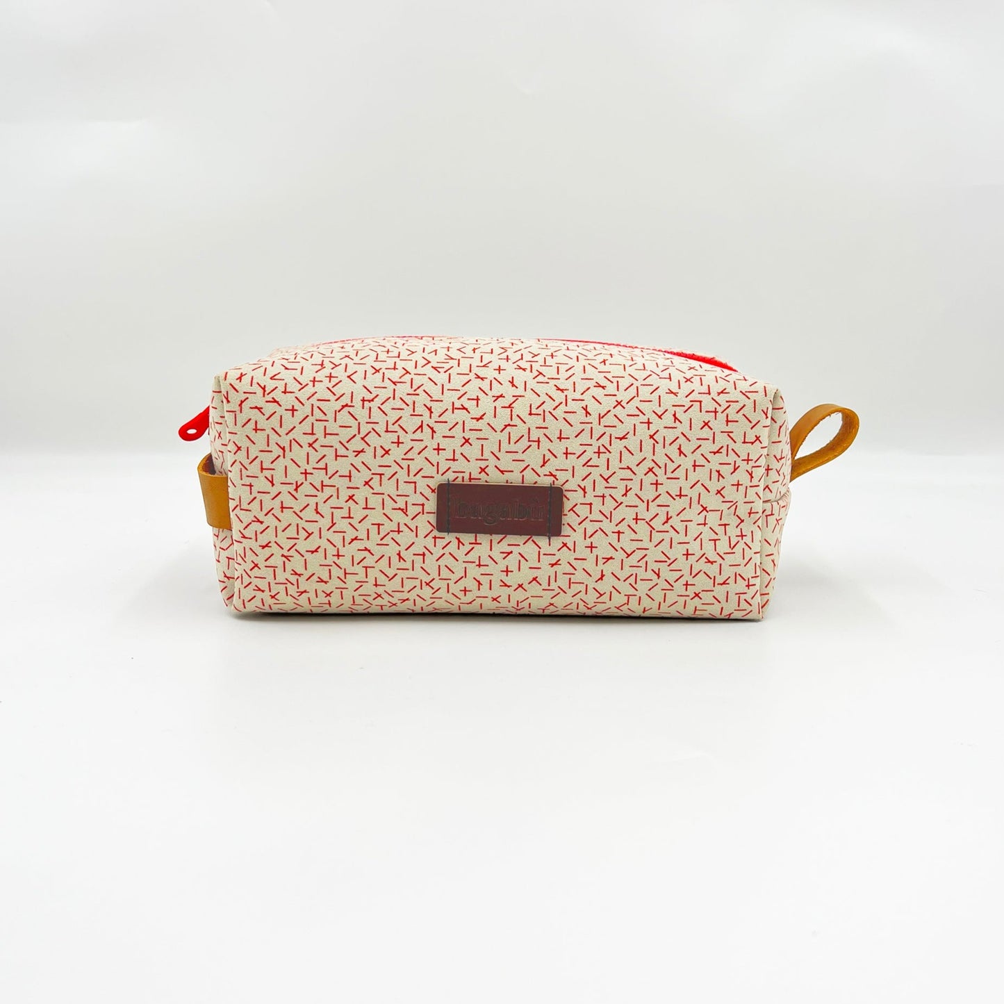 white and red toiletry bag