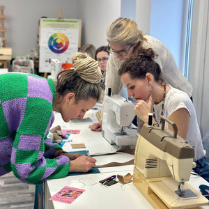 workshop participants with toiletry bags