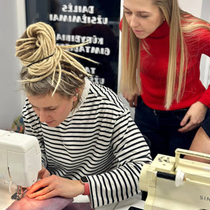 beginner workshop person using a sewing machine