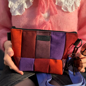 purple and red vagabond bag