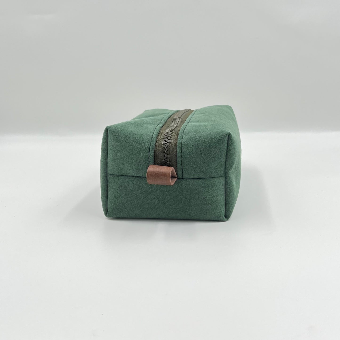 green handmade toiletry bag