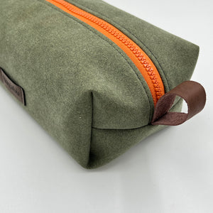 green toiletry bag