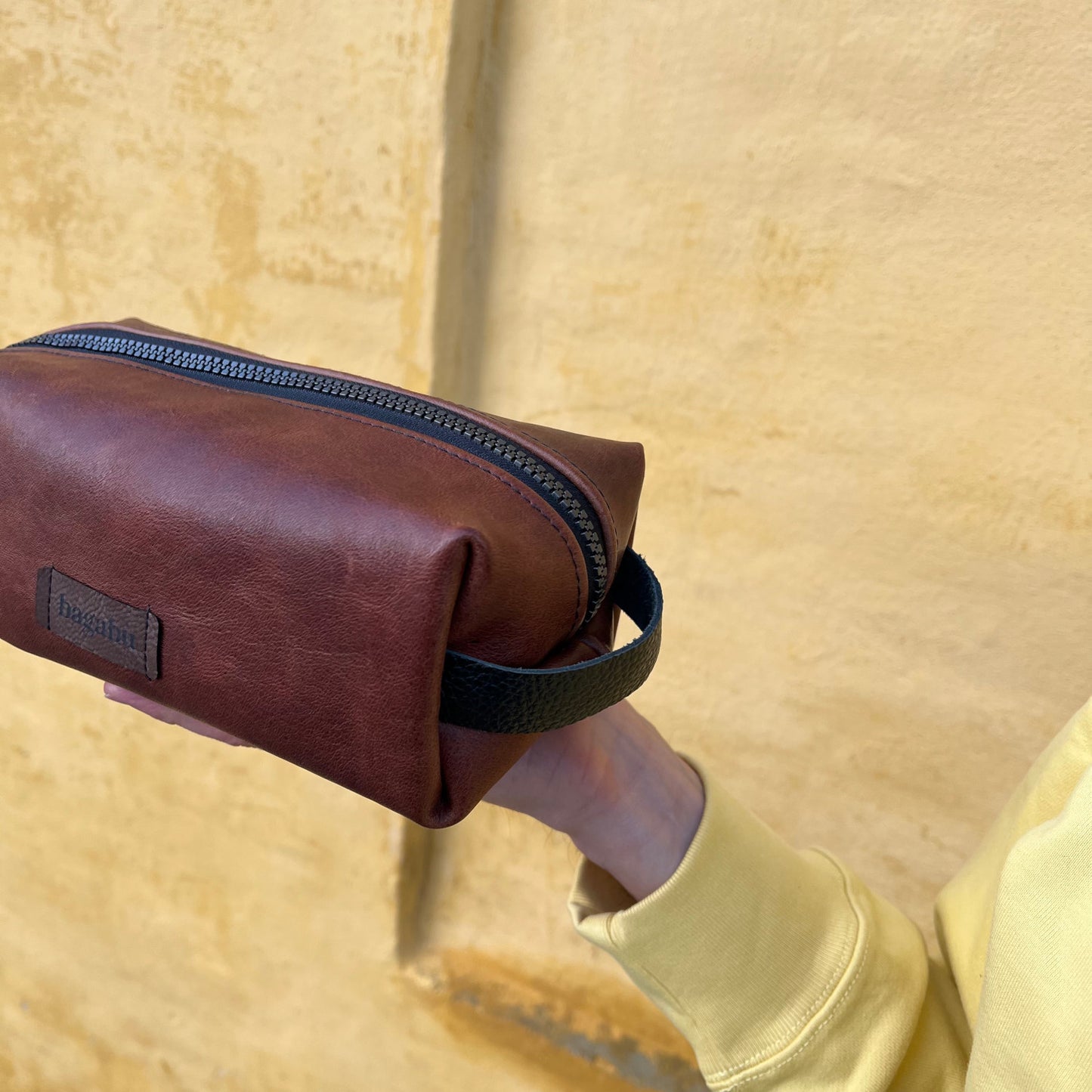 brown leather toiletry bag