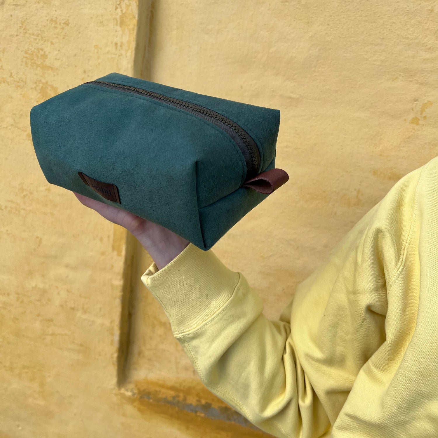 green handmade toiletry bag