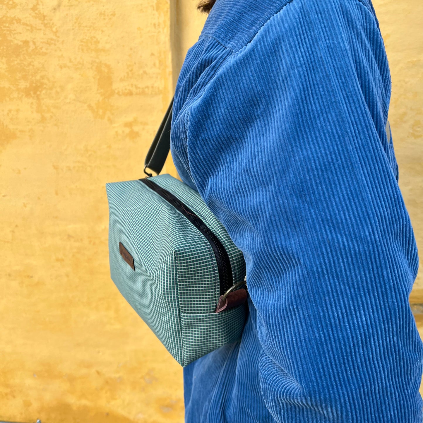 green with stripes bag
