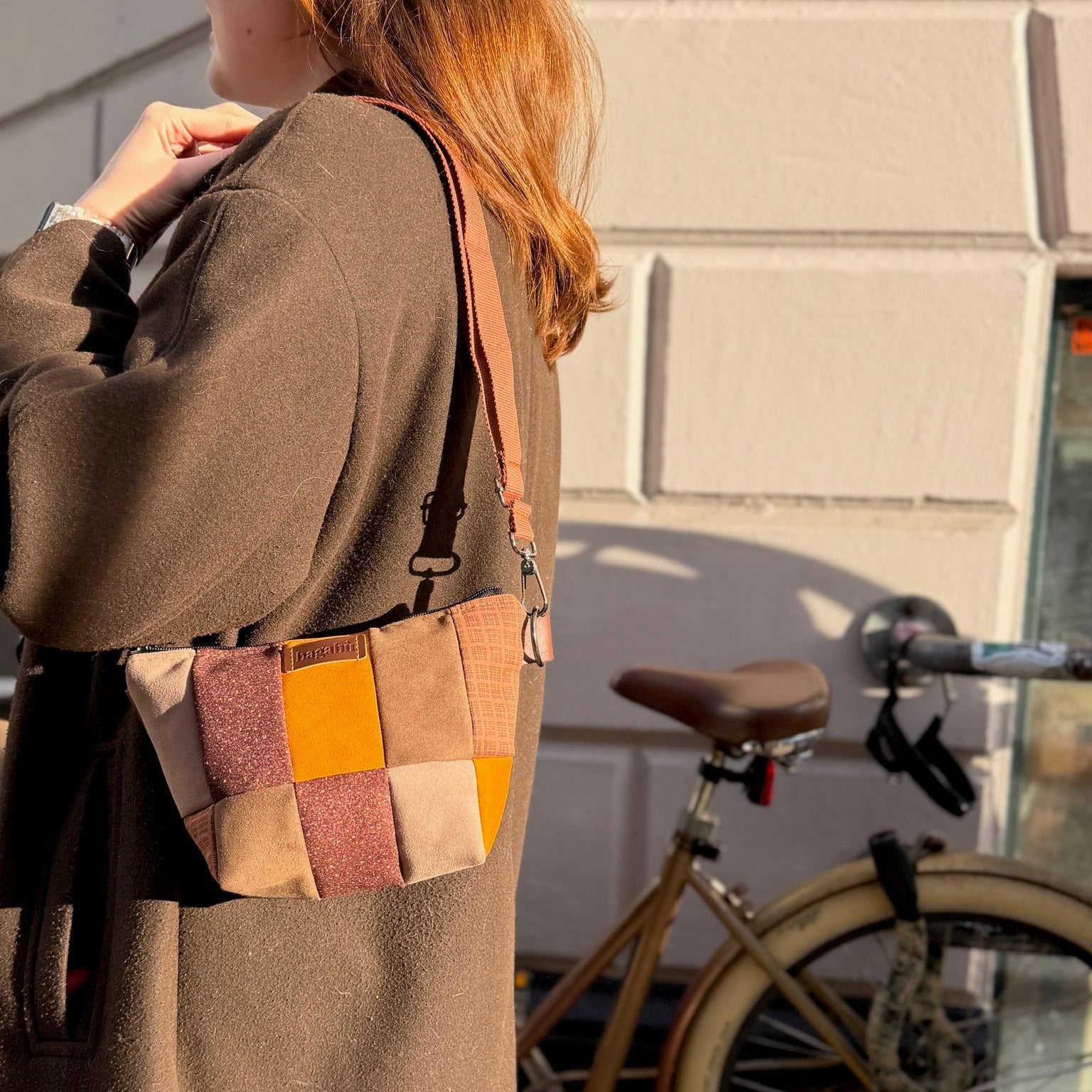 brown and orange vagabond patch bag