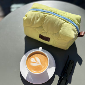 butter yellow toiletry bag