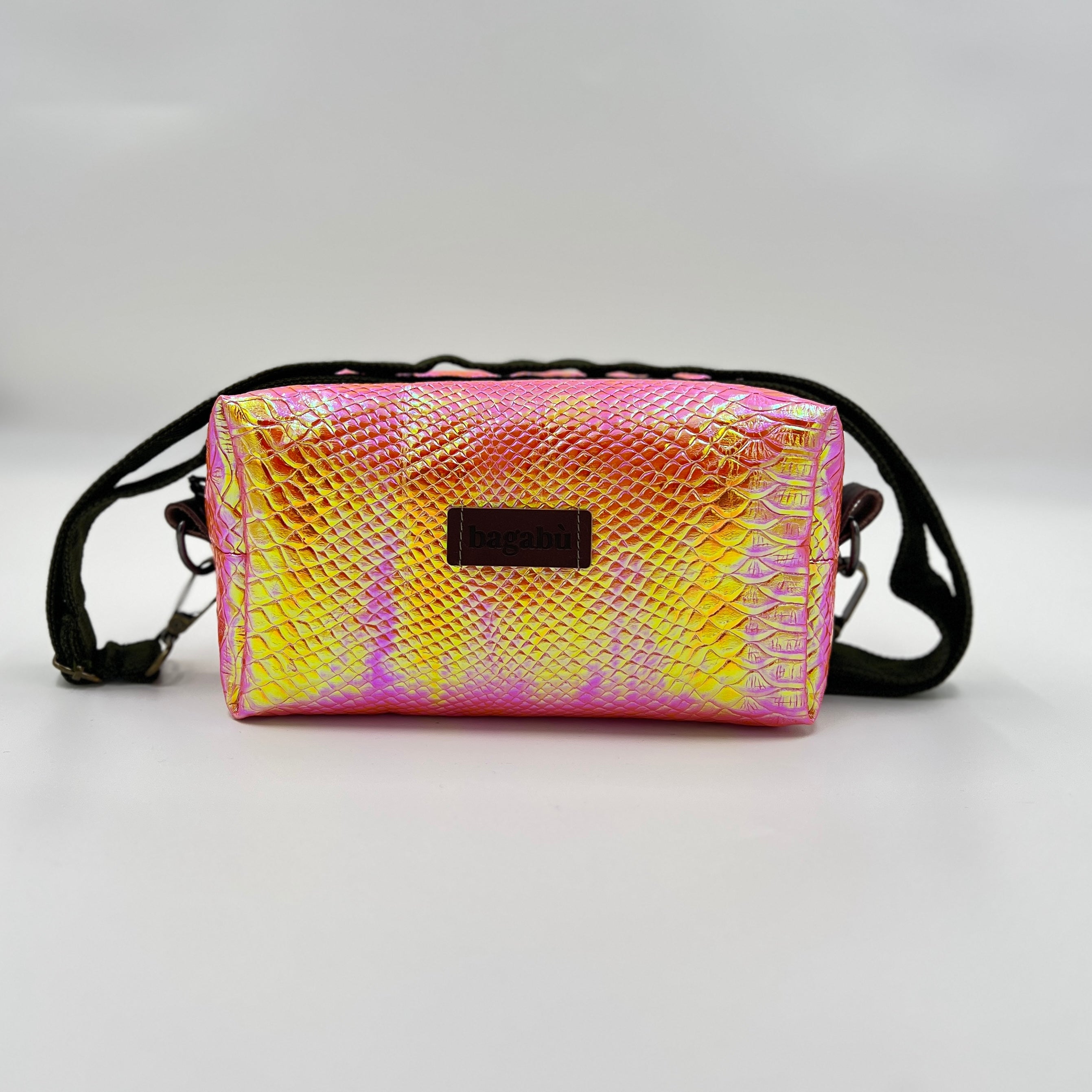 Pink and yellow patterned crossbody bag on a light gray background