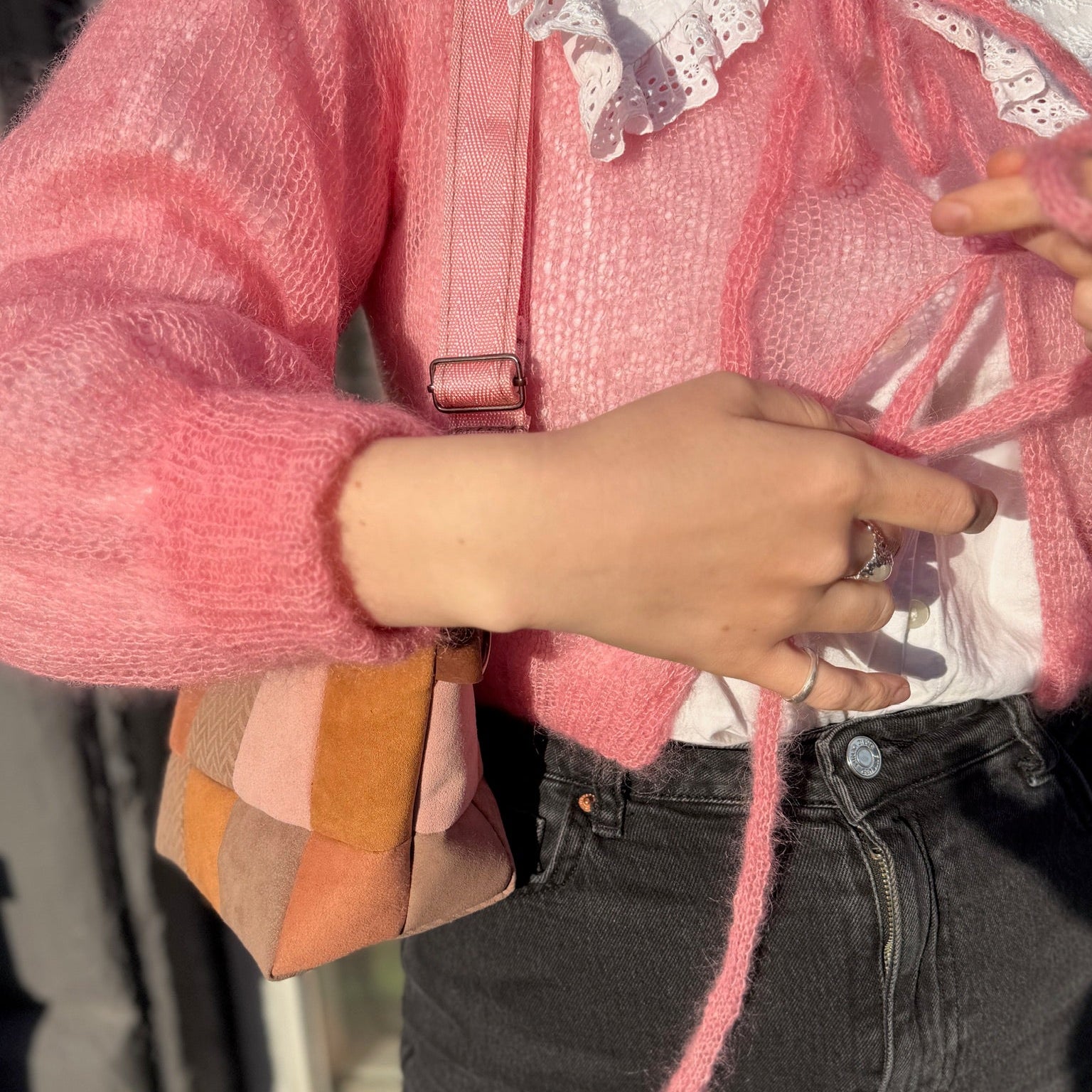 pink and beige color patch bag