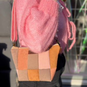 pink and beige color patch bag
