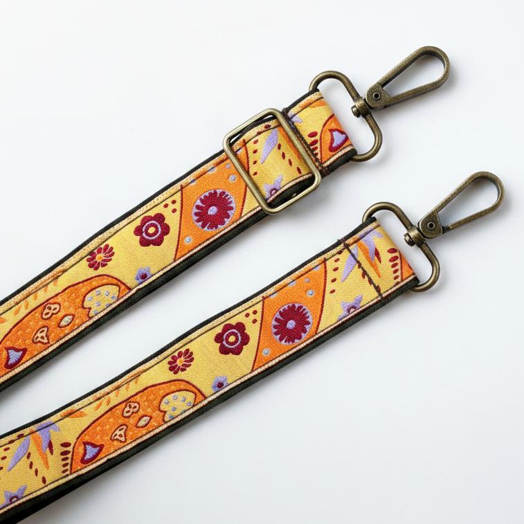 yellow and orange and blue bag strap
