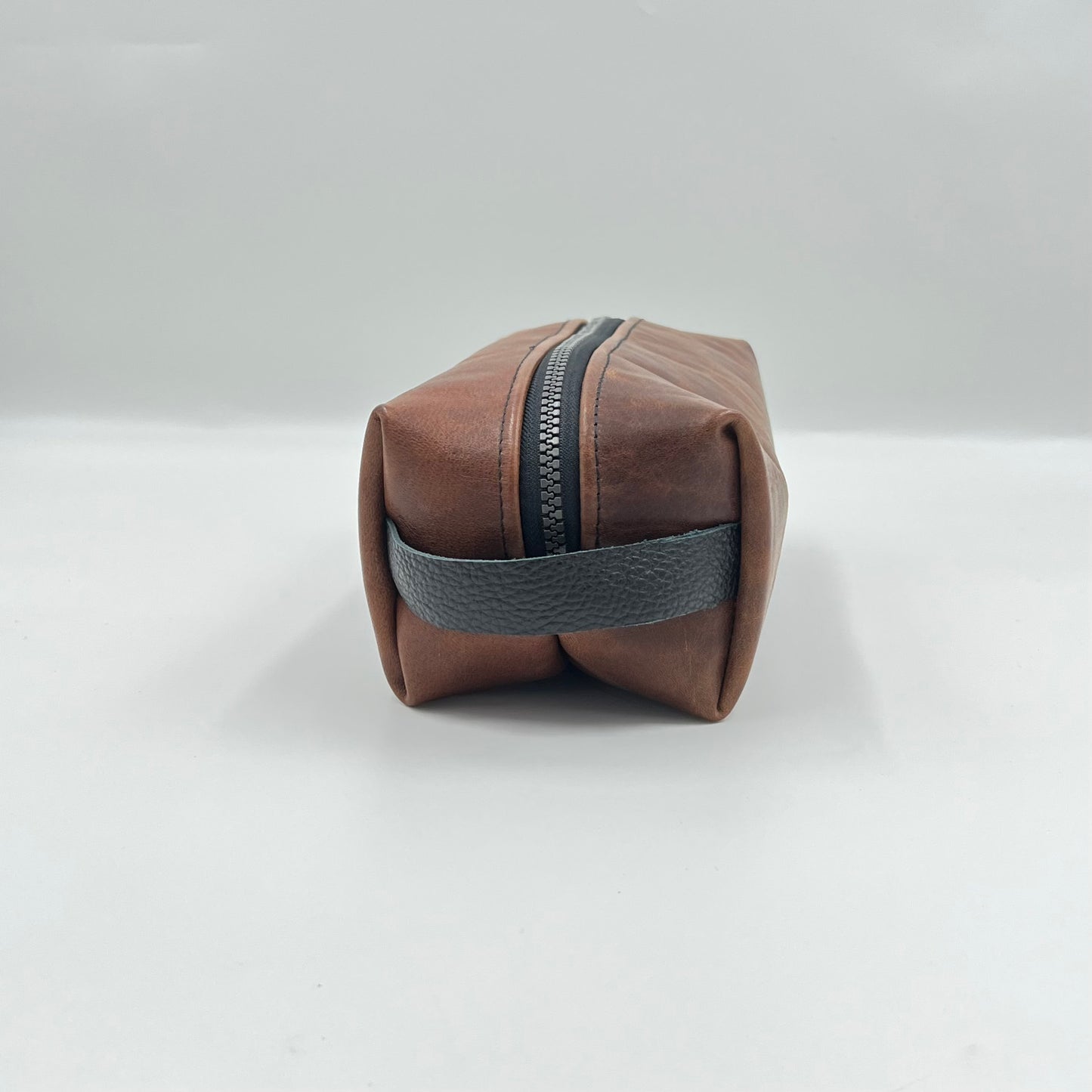 brown leather toiletry bag