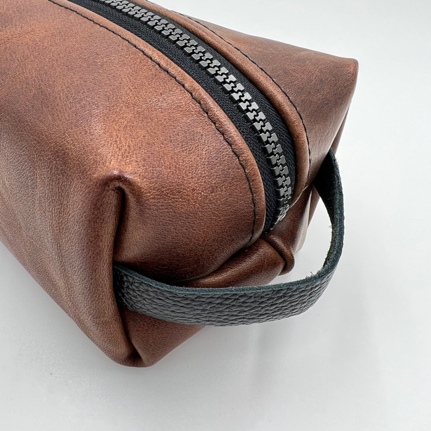 brown leather toiletry bag