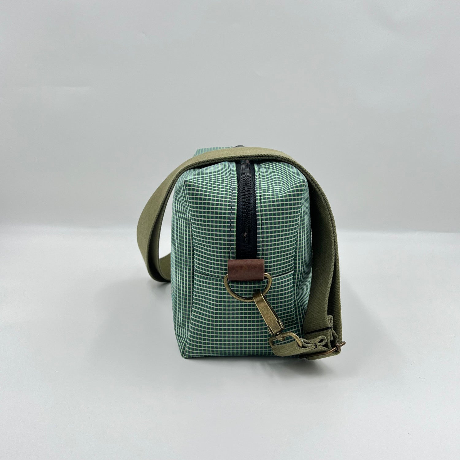 green with stripes bag