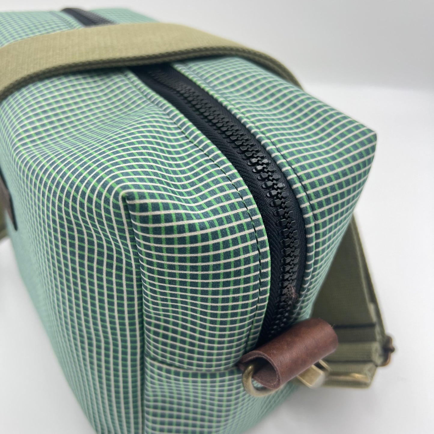 green with stripes bag