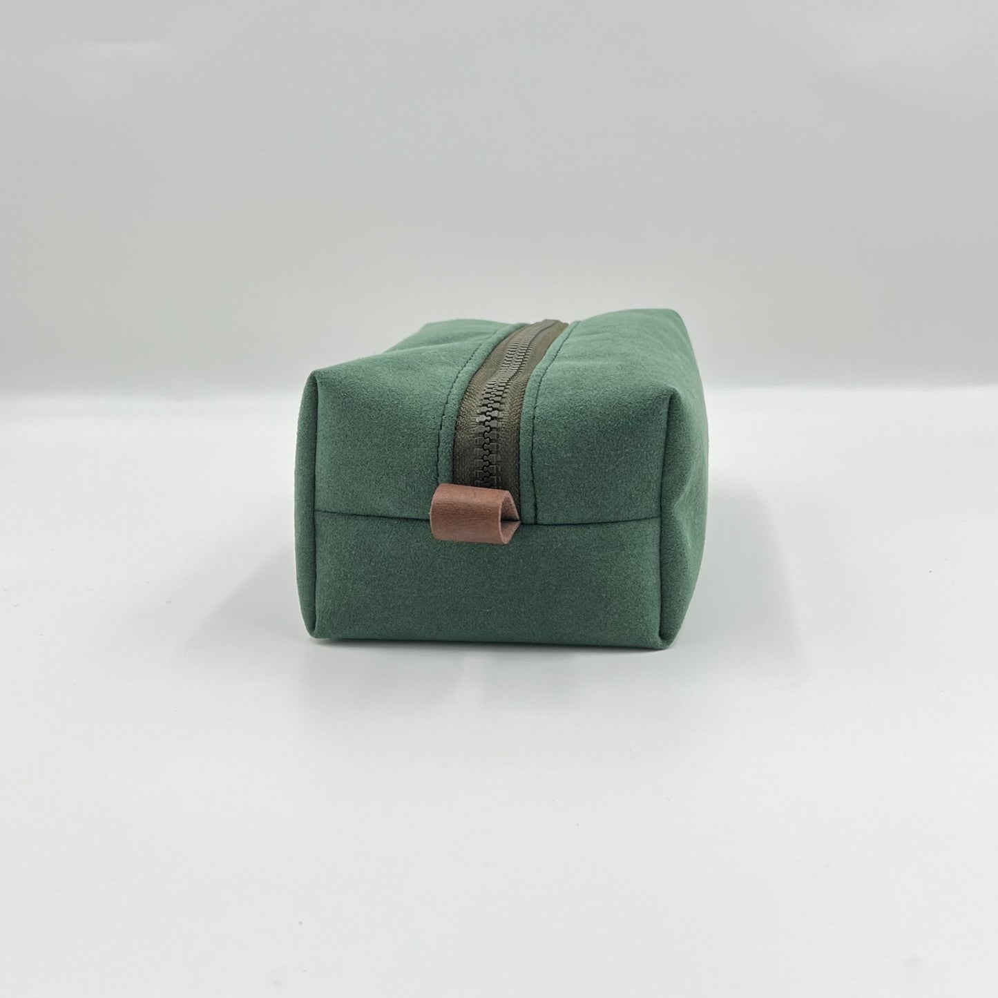 green handmade toiletry bag