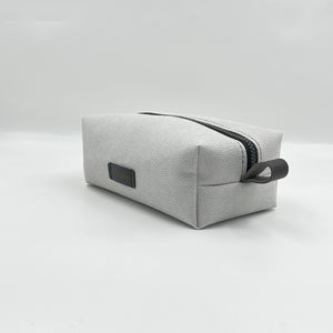 white toiletry bag