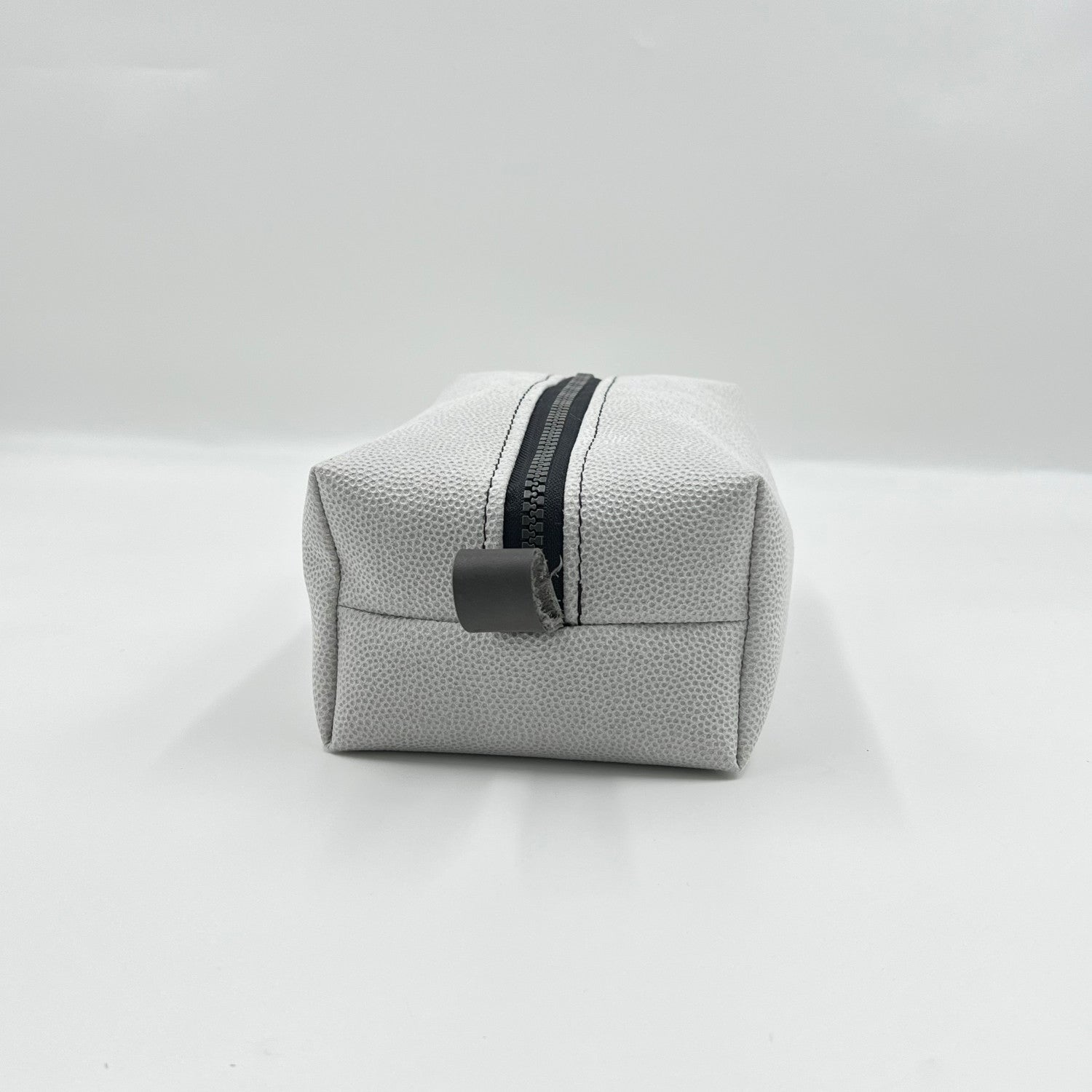 white toiletry bag