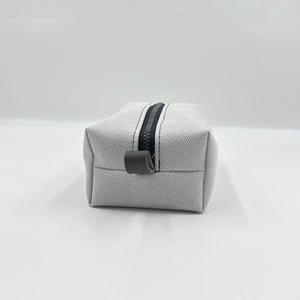 white toiletry bag