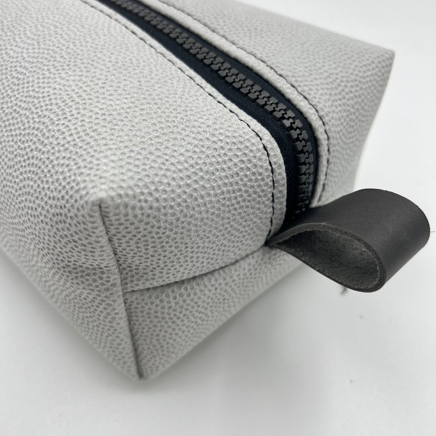 white toiletry bag