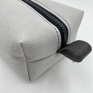 white toiletry bag