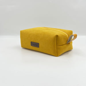yellow alcantara toiletry bag