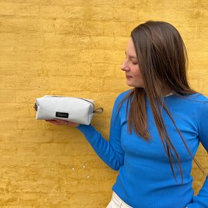 white toiletry bag